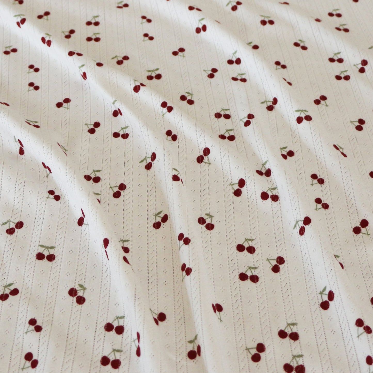 Pointelle Jersey Kirsche 'Creme'
