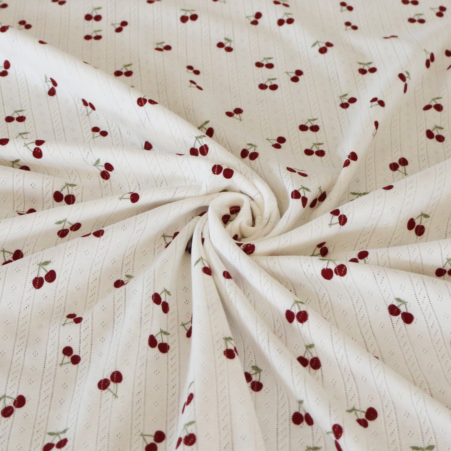 Pointelle Jersey Kirsche 'Creme'